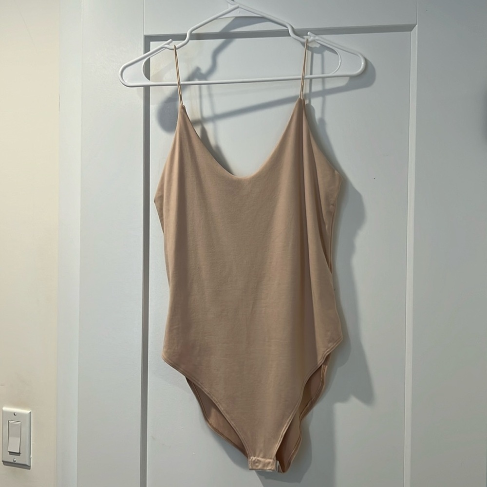Soft tan bodysuit